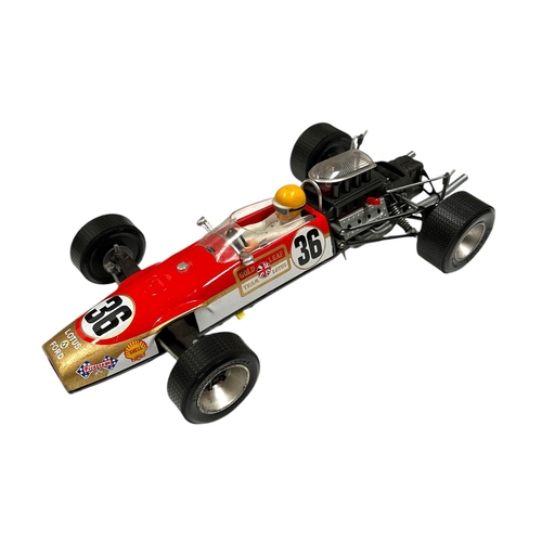 59 - A 1970's Junior Products (Japan) tinplate battery operated Lotus 49 Ford F-1 Formula Racing Car cons... 