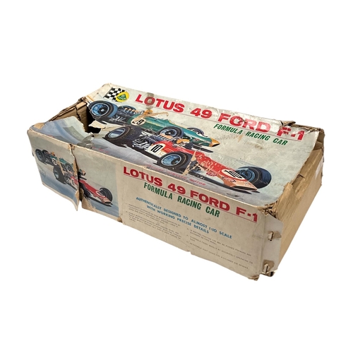 59 - A 1970's Junior Products (Japan) tinplate battery operated Lotus 49 Ford F-1 Formula Racing Car cons... 