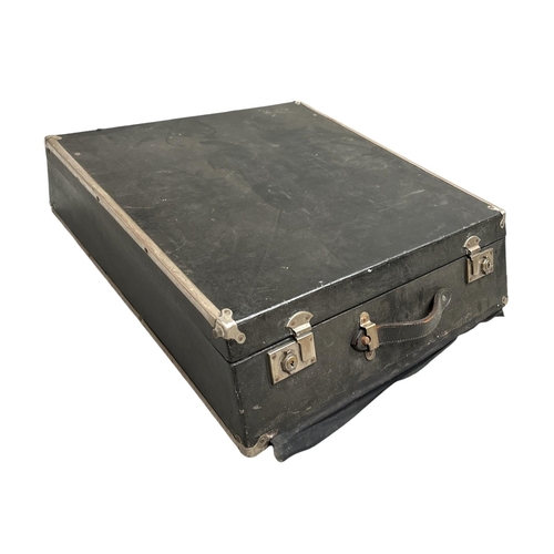 67 - A vintage black Rexine covered motoring trunk believed to have fitted to a Bentley Mk 6, 61cms wide.