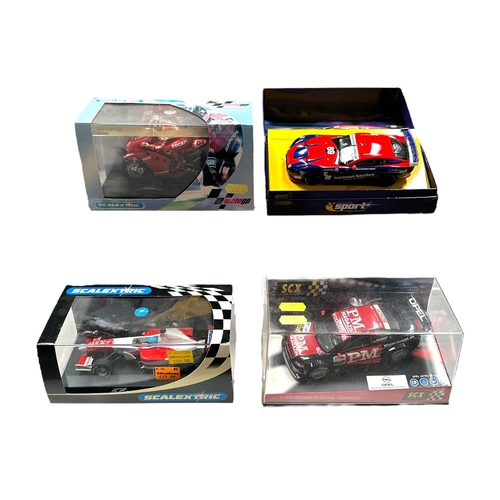 78 - A small collection of Scalextric Model Sports Cars, GP Cars and Motorcycles including Toyota F1 (200... 