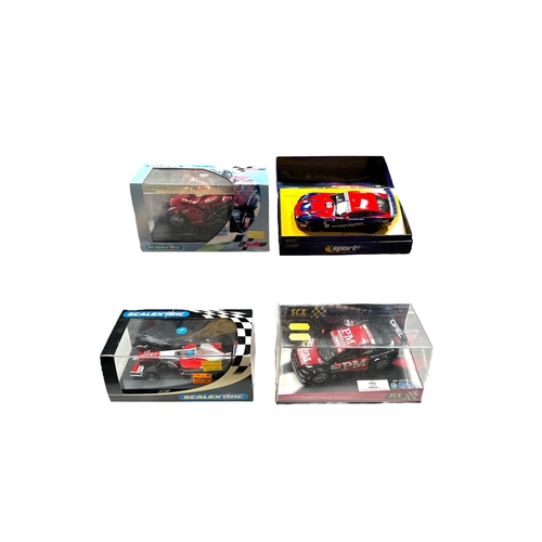 78 - A small collection of Scalextric Model Sports Cars, GP Cars and Motorcycles including Toyota F1 (200... 