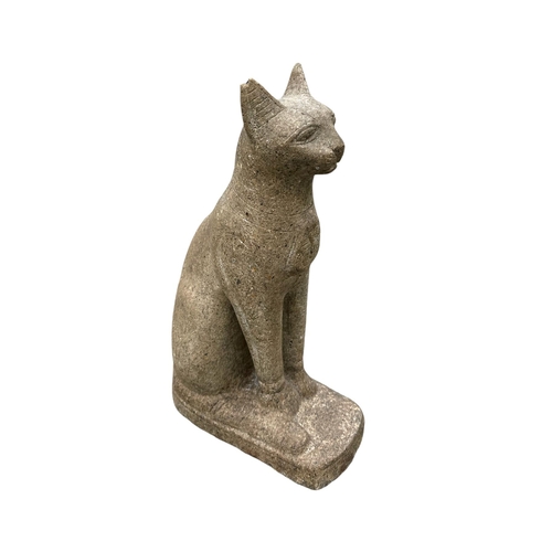 1 - A stoneware figure of an Egyptian seated cat.