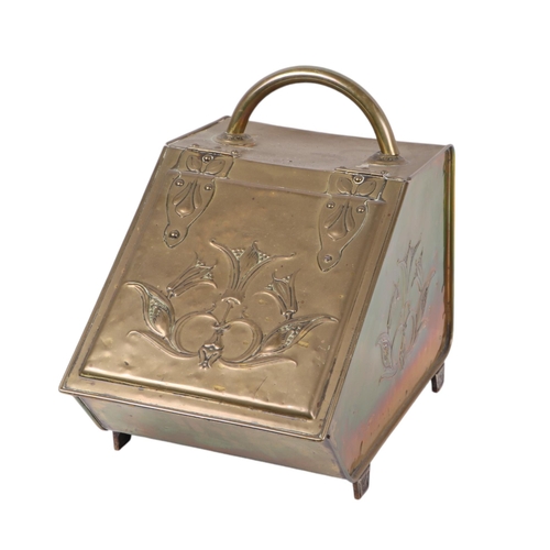 104 - An Art Nouveau brass coal scuttle.