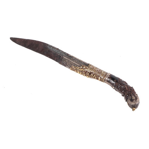 120 - An antique Sinhalese Piha Kaetta knife with carved handle, 19cms long.