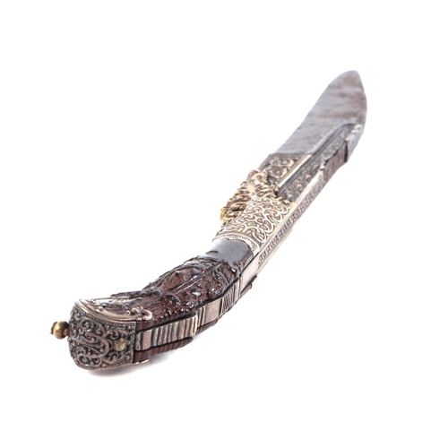 120 - An antique Sinhalese Piha Kaetta knife with carved handle, 19cms long.