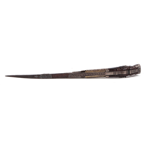 120 - An antique Sinhalese Piha Kaetta knife with carved handle, 19cms long.