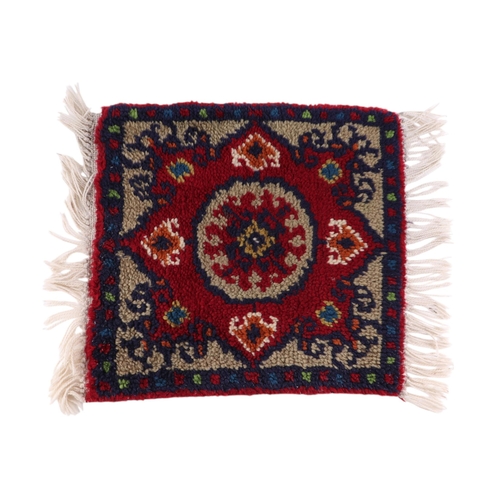 127 - A group of three hand knotted sample rugs, each 37 by 39cms (3).