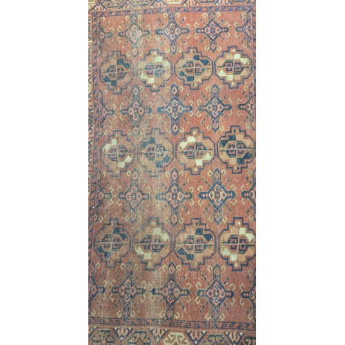 129 - A Persian Hamadan rug with repeated medallions on a red ground, 104 by 163cms.Condition ReportHas be... 