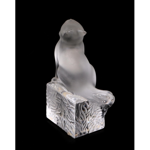 241 - A modern Lalique frosted glass figure in the form of a seated cat, 14.5cms high.