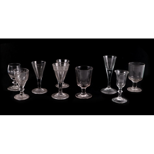 245 - A quantity of mixed glassware to include a lace maker's lamp, scent bottles and wine glasses.