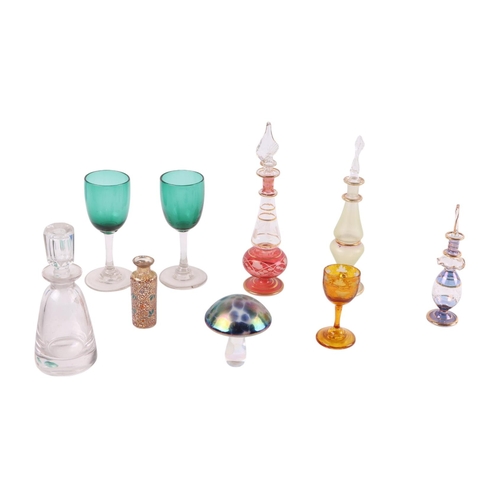 245 - A quantity of mixed glassware to include a lace maker's lamp, scent bottles and wine glasses.