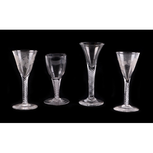 246 - A group of 19th century and later glasses, some with air twist stems, an etched glass decanter and a... 