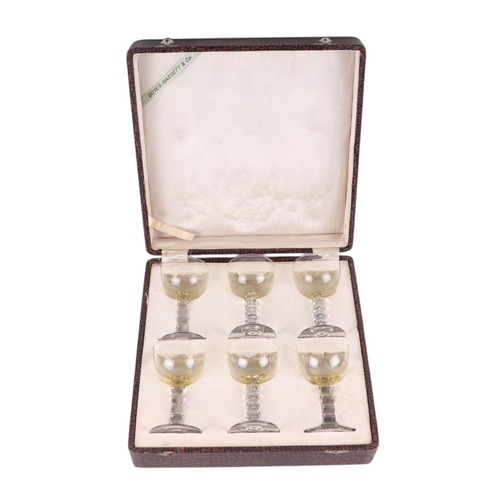 248 - An early 20th century boxed set of Boye's Bassett & Co. wine glasses, each glass 11cms high.