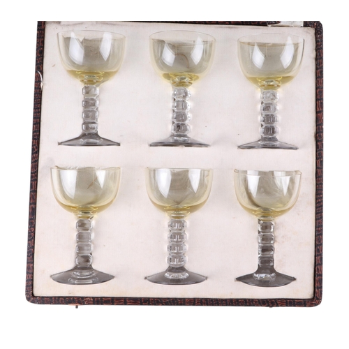 248 - An early 20th century boxed set of Boye's Bassett & Co. wine glasses, each glass 11cms high.