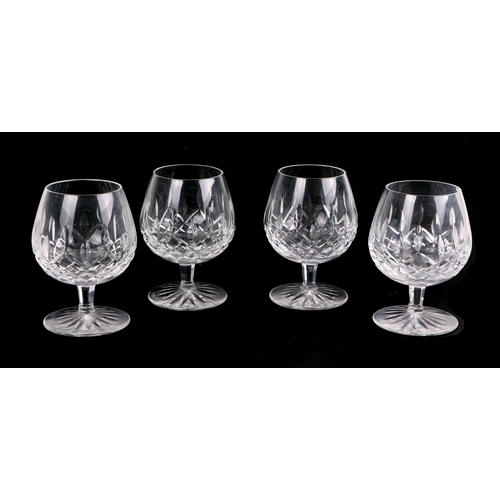 249 - A large quantity of Waterford Lismore crystal to include champagne flutes, hock glasses, wine glasse... 