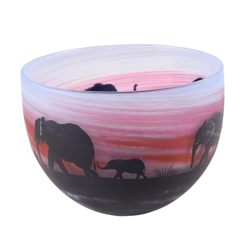 251 - A Malcolm Sutcliffe Studio Cameo glass bowl decorated with an African sunset scene and a herd of ele... 