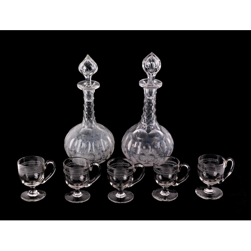 252 - A quantity of assorted glassware to include a pair of cut glass decanters; a set of four custard cup... 