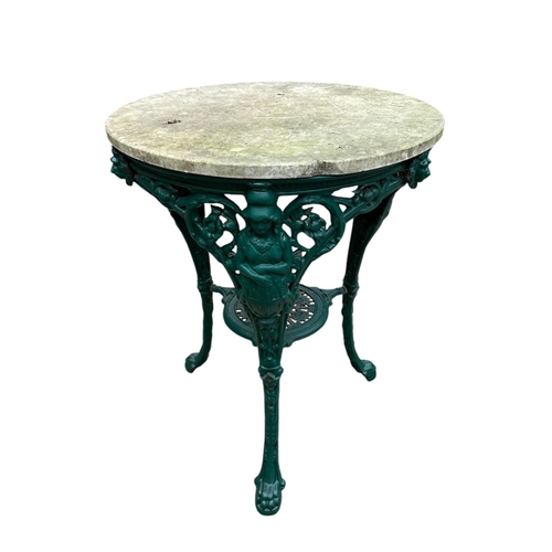 3 - A painted cast iron Britannia pub table with marble top, 62cms wide.