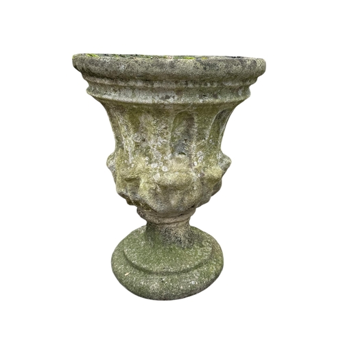 6 - A stoneware garden planter, 50cms high.