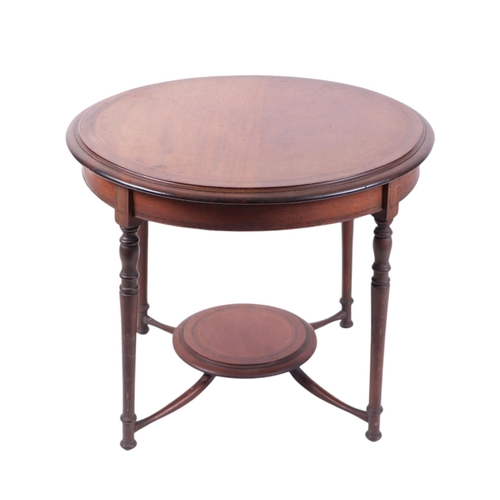 820 - An Edwardian walnut occasional table, the circular top with ebony and boxwood cable and string inlay... 