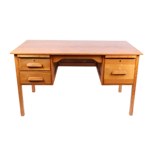 825 - An oak utility kneehole desk with an arrangement of two drawers and a single cupboard, on square leg... 