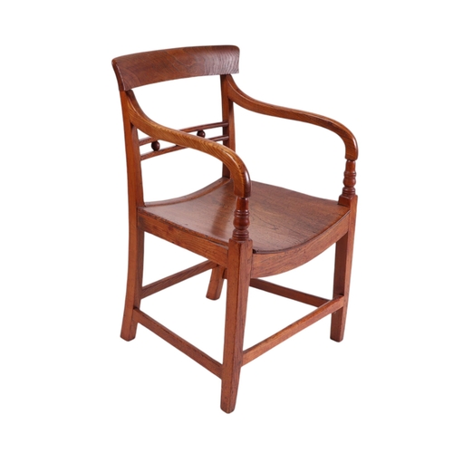 827 - A 19th century oak carver chair with solid seat, tapering square legs joined by stretchers.