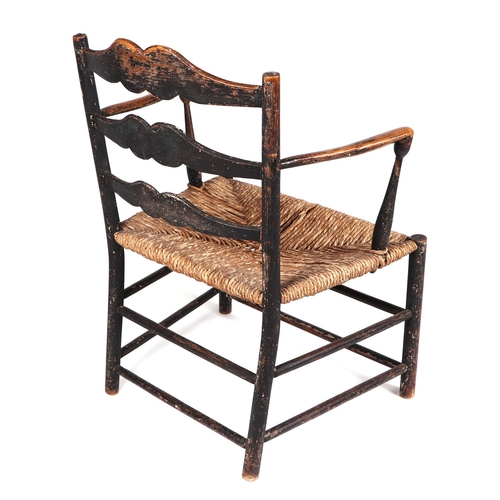 832 - An Arts and Crafts Pass chair in the style of Ernest Gimson (1864-1919), made in ebonised ash with r... 