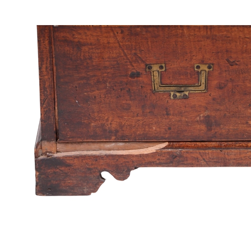 836 - A 19th century teak secretaire Campaign chest of small proportions, the top drawer opening to reveal... 