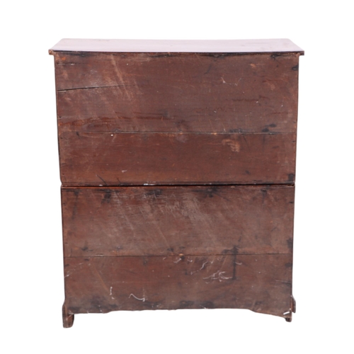 836 - A 19th century teak secretaire Campaign chest of small proportions, the top drawer opening to reveal... 