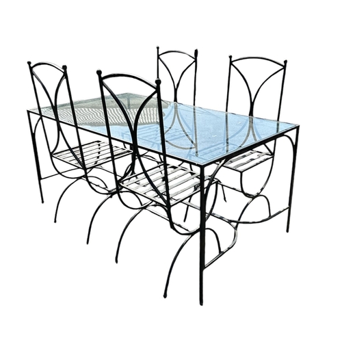 9 - A large glass topped metalwork table, 93 by 170cms; together with four matching chairs (5).