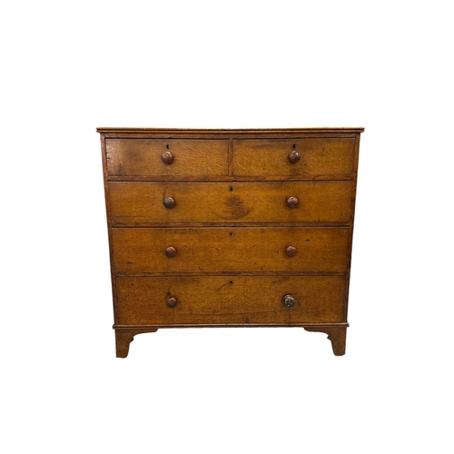 834 - A 19th century oak chest with two short and three graduated long drawers standing on bracket feet. 1... 