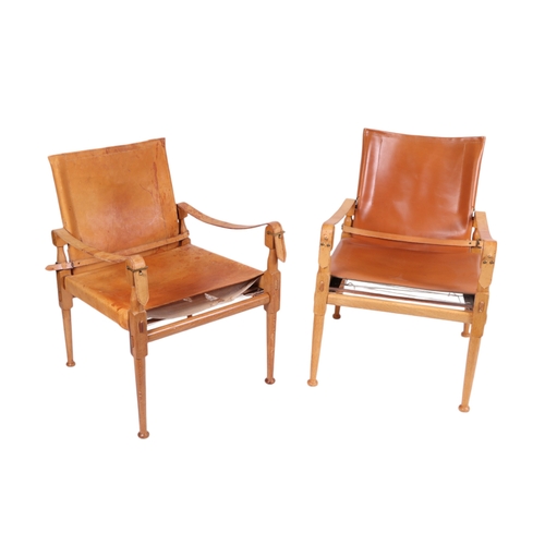 814 - Manner of Borge Mogensen ( 20th century Danish) - A set of three modern design Campaign style chairs... 