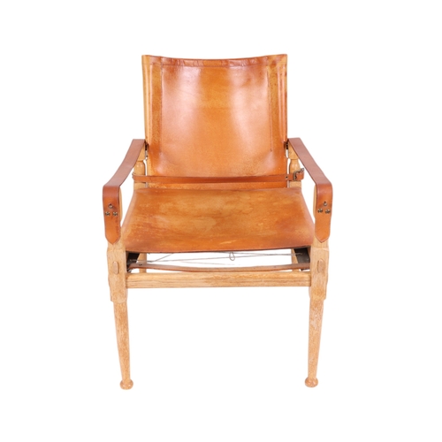 814 - Manner of Borge Mogensen ( 20th century Danish) - A set of three modern design Campaign style chairs... 