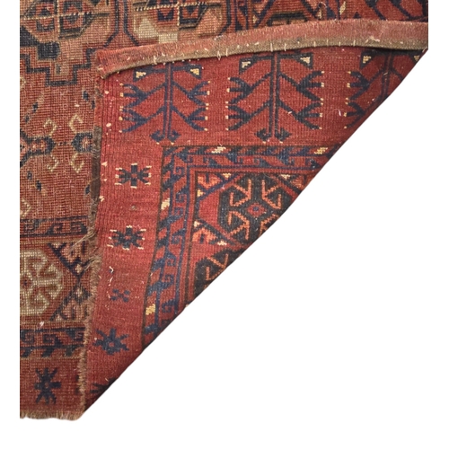 129 - A Persian Hamadan rug with repeated medallions on a red ground, 104 by 163cms.Condition ReportHas be... 