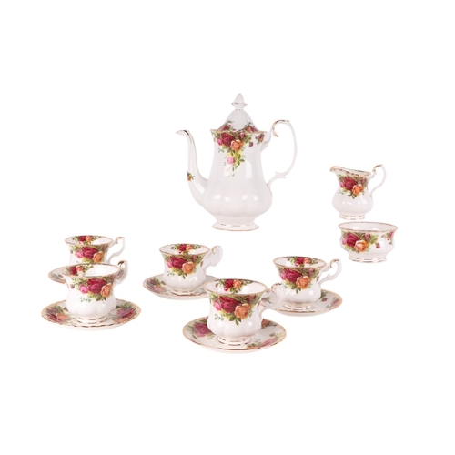 255 - A Royal Albert Country Roses pattern tea and coffee set.