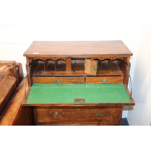 836 - A 19th century teak secretaire Campaign chest of small proportions, the top drawer opening to reveal... 