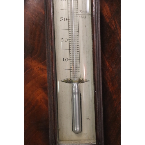 97 - A 19th century barometer thermometer, the silvered dial signed 'J Sutherland Derby', 93cms high.