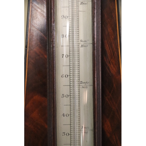 97 - A 19th century barometer thermometer, the silvered dial signed 'J Sutherland Derby', 93cms high.