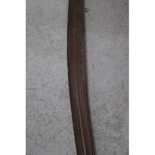 115 - An Indian Tulwar sword having a Turkish style Kilij shaped blade, possibly late 18th / 19th century.... 