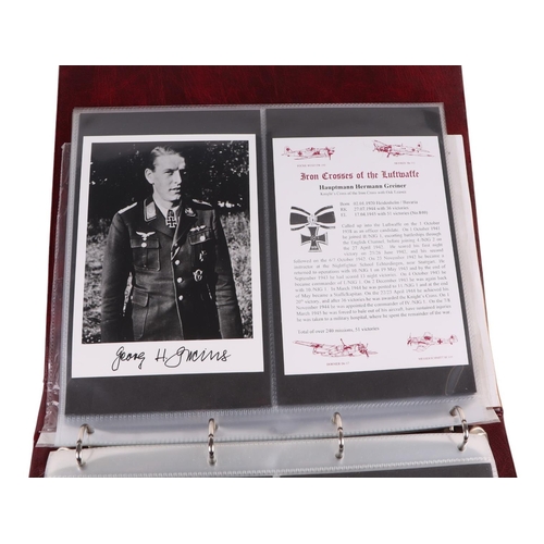 109 - Two albums of WWII Luftwaffe and German U-Boat Iron Cross winners original autographed photographs (... 