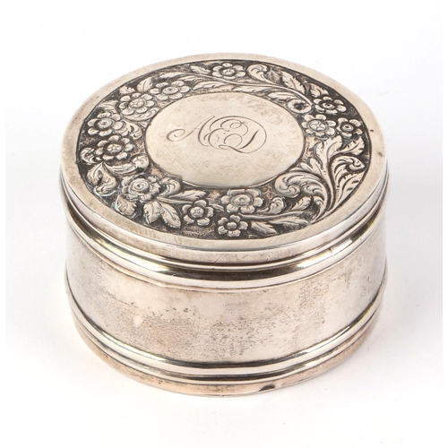 1149 - A Georgian silver box and cover of circular form with embossed foliate decoration, Edinburgh 1827, 7... 