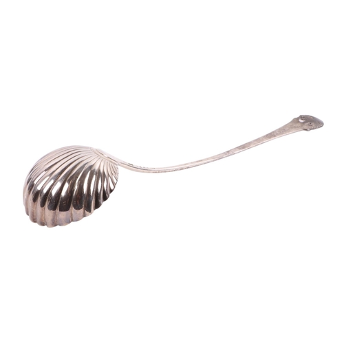 1151 - A George III silver ladle with shell shaped bowl, indistinct London hallmarks and makers mark for Wi... 