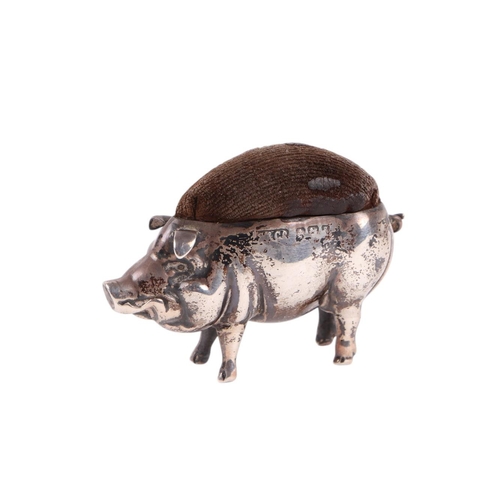 1153 - An Edwardian novelty silver pin cushion in the form of a pig, Birmingham 1906 and makers mark for Sy... 