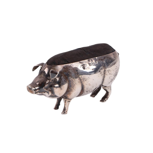 1155 - An Edwardian novelty silver pin cushion in the form of a pig, Birmingham 1907 and makers mark for Ad... 