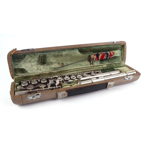 1616 - A silver plated three-piece flute, model no. S81, cased.