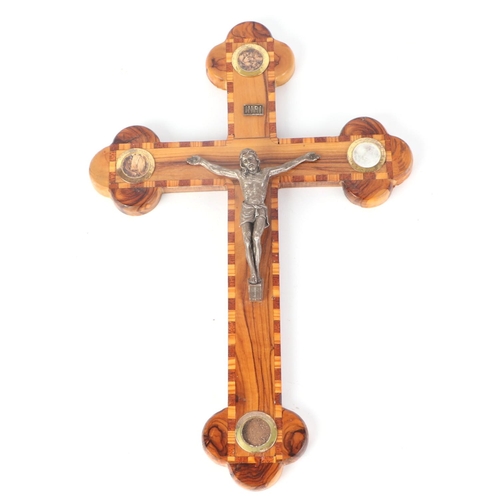 1643 - An inlaid Jerusalem olivewood crucifix with silver plated figure of Christ, 38cms high.