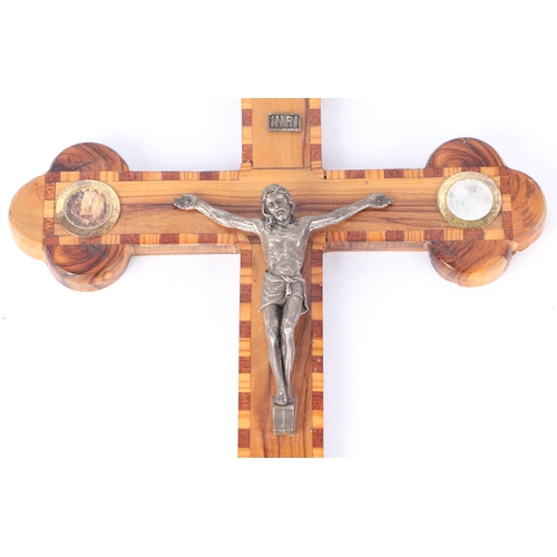 1643 - An inlaid Jerusalem olivewood crucifix with silver plated figure of Christ, 38cms high.