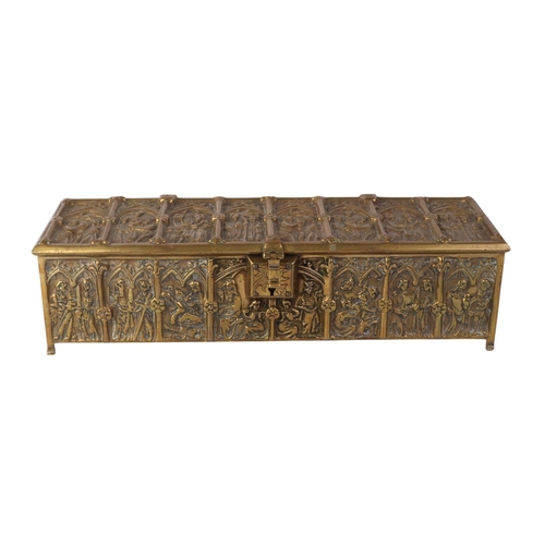 1648 - A brass candle box in the Gothic Revival taste, 30cms wide.