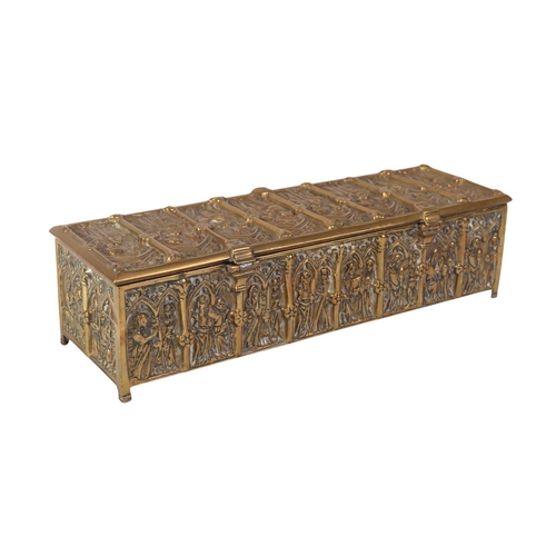 1648 - A brass candle box in the Gothic Revival taste, 30cms wide.