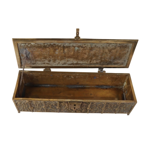 1648 - A brass candle box in the Gothic Revival taste, 30cms wide.